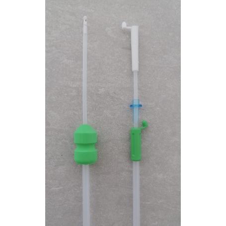 Sonda intrauterina con sistema de bloqueo de tubos y tapones de cierre